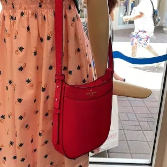 kate spade Handbags - NEW WITH TAGS. Kate Spade crossbody Leila north south purse in bikini pink.